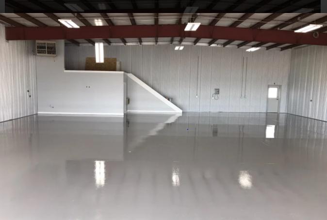 Steel-coated floor in a space