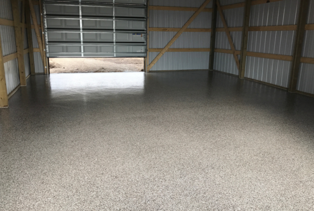 a garage with a new epoxy floor