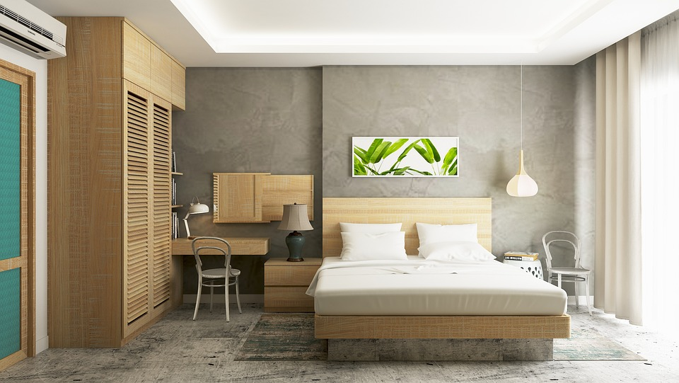 an image of a bedroom with concrete floor coating